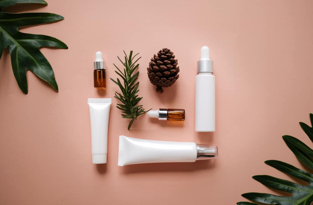 Beauty products are arranged neatly on a table.