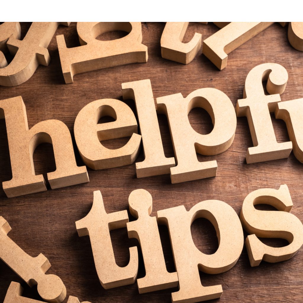 Wooden blocks spell out, ''helpful tips''.